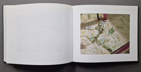 an open book spread with a colour photo on the right