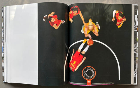 In The Moment: 40 Years of Reuters Photojournalism - Setanta Books