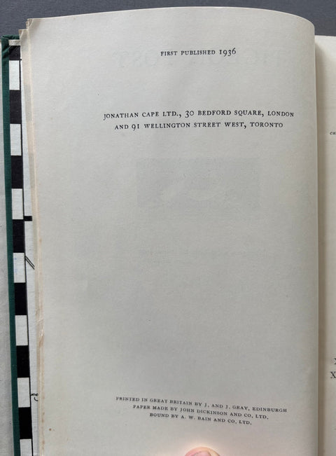 Page from a book with text about publication details and addresses.