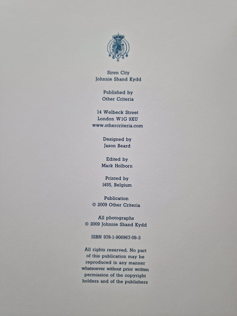 A flat, front-facing view of a white printed publication page with black text and a small crest at the top, likely a book or journal copyright page. Visible text includes 'Siren City Johnnie Shand Kydd', 'Published by Other Criteria', and publisher address in London.