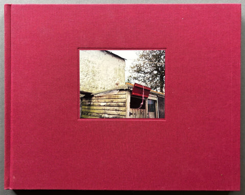 Book titled 'The Moth' by Jem Southam with a burgundy cover featuring the image of a shed.