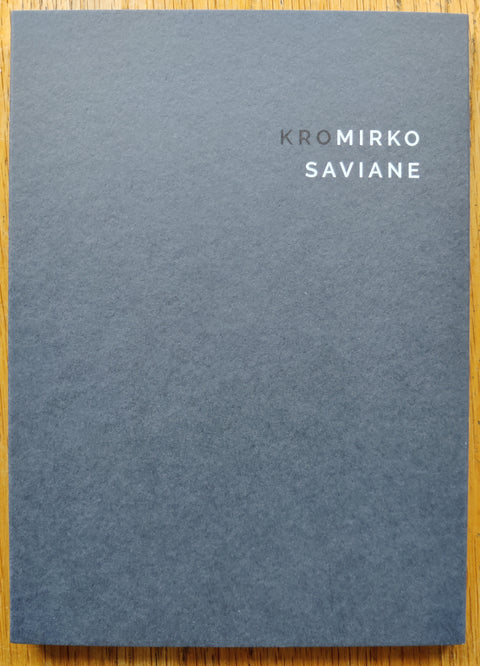 The photography book cover of 010 - Mirko Saviane. In softcover dark grey.