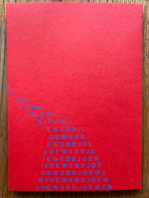 The photography book cover of 011 - Joe Webb. In softcover red.
