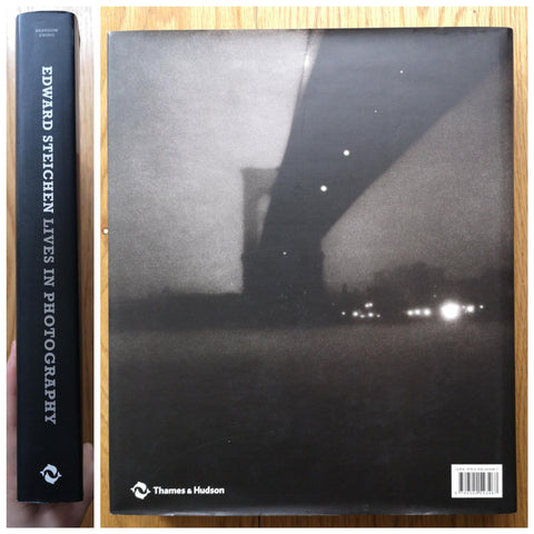 The photography book cover of Lives in Photography by Edward Steichen. In dust jacketed hardcover black.