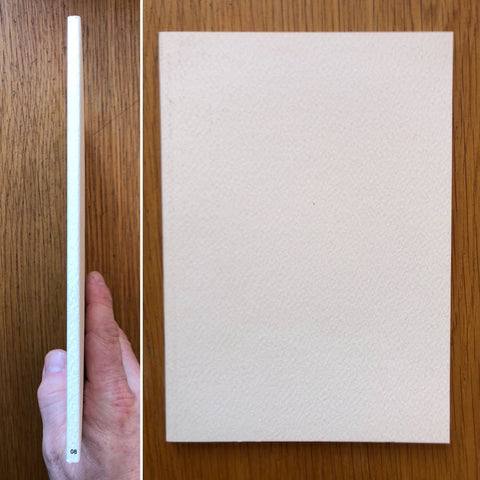 The photography book cover of 8 by Lina Scheynius. Paperback beige cover.
