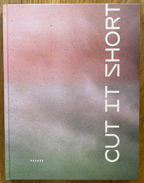 The photobook cover of Cut it Short by Michal Solarski and Tomasz Liboska. In hardcover. Double signed.