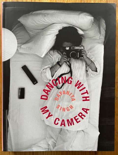 The photography book cover of Dancing With My Camera by Dayanita Singh. In hardcover.