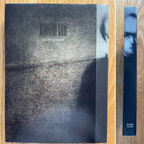 The photography book cover of Past Perfect Continous by Igor Posner. In hardcover dark.