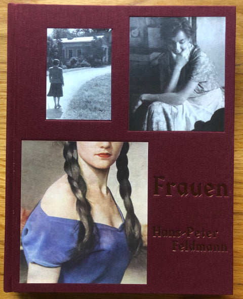 The photography book cover of Frauen by Hans-Peter Feldmann. Hardback in dark red with three images on the cover.
