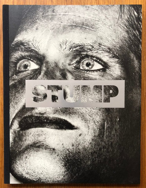 The photography book cover of STUMP by Christopher Anderson. Paperback with B&W image of a man on the front.