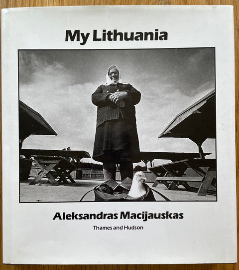 The photography book cover of My Lithuania by Aleksandras Macijauskas. In dust jacketed hardcover white.