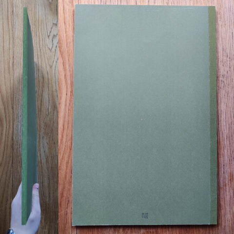 The photography cover of Entrance to Our Valley by Jenia Fridlyand. In paperback green.