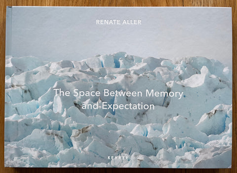 The photography book cover of The Space between Memory and Expectation by Renate Aller. In hardcover with a photo of an iceberg.