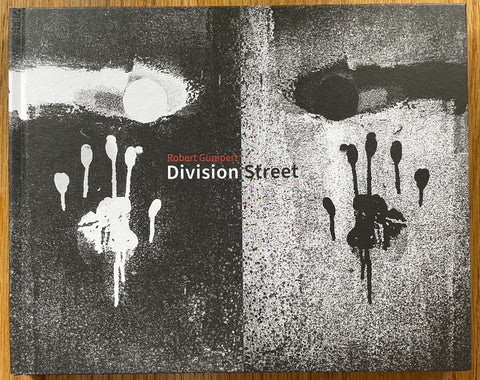 The photobok cover of Division Street by Robert Gumpert. In hardcover black and white.