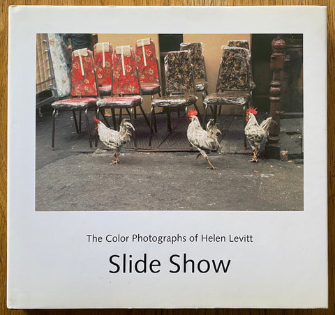 The photography book cover of Slide Show by Helen Levitt. In hardcover with dust jacket with text and image.