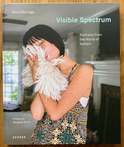 This is the cover of Visible Spectrum with a portrait of a girl on the cover