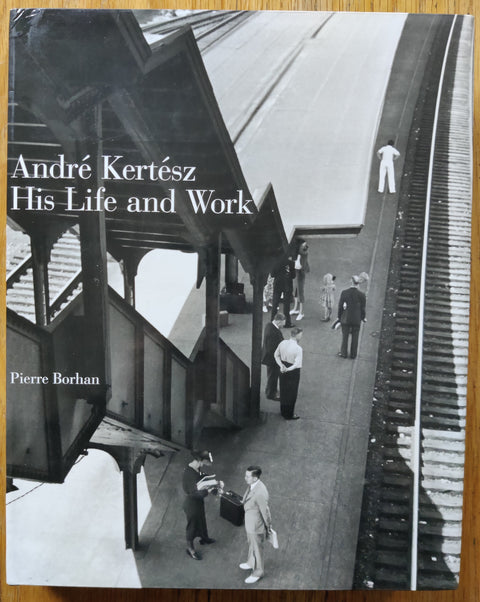 The photography book cover of His Life and Work by André Kertész. In dust jacketed hardcover dark grey.