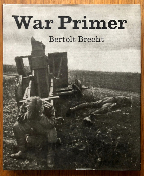 The photography book cover of War Primer by Bertolt Brecht. Hardback B&W cover.