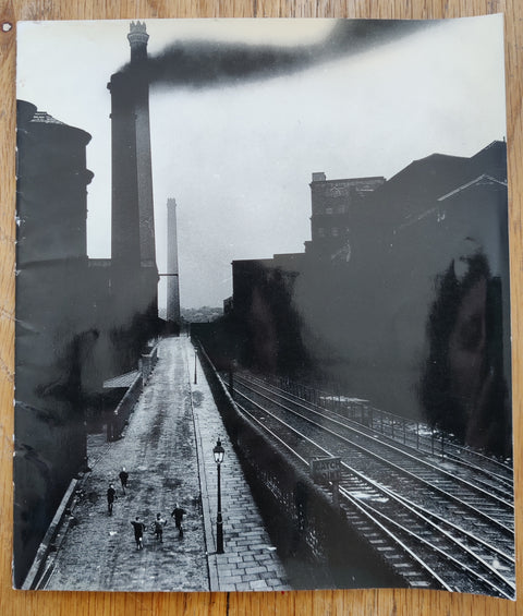 The photobook cover of Early Photographs 1930-1942 by Bill Brandt. In soft cover black and white.
