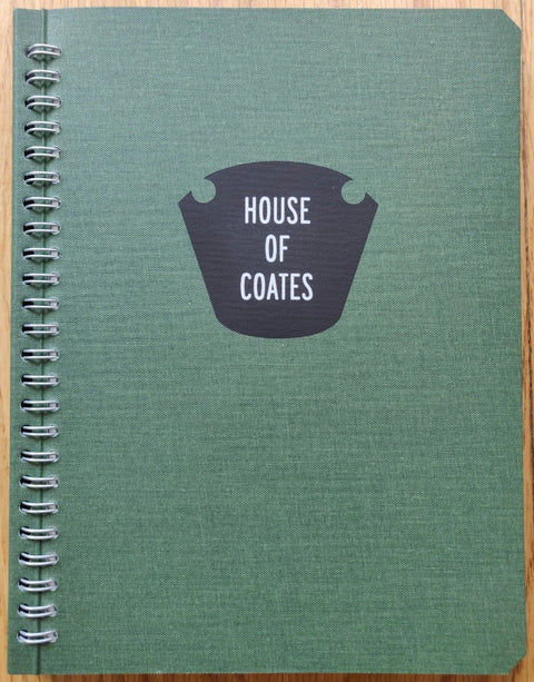 The photography book cover of House of Coates by Brad Zellar. Paperback in green with ring binding.