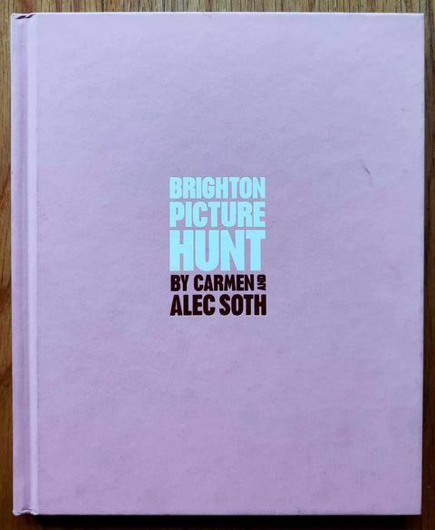 The photography book cover of Brighton Picture Hunt by Carmen Soth and Alec Soth. Hardback in light pink.