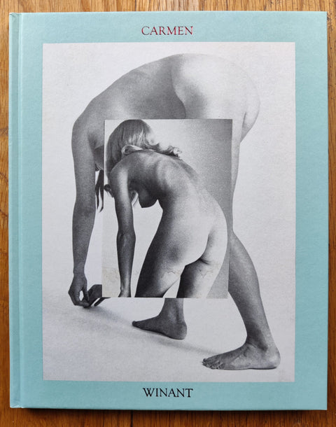 The photography book cover of Body Index by Carmen Winant. Hardback with light blue border and B&W nude image of a girl bending over.