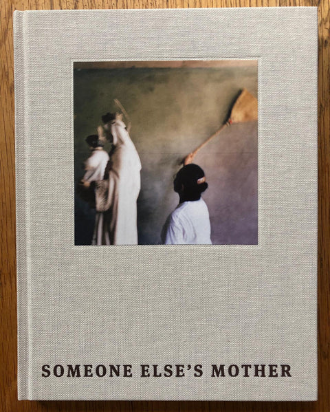The photography book cover of Someone Else's Mother by Caroline Irby. Hardback in light grey. Signed.