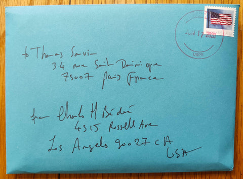 The envelope containing prints for LA lockdown photobook by Charles-Henry Bedue. Blue envelope addressed to Thomas Sauvin in Paris from LA.