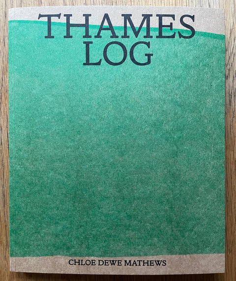 The photography book cover of Thames Log by Chloe Dewe Mathews. Paperback in green.