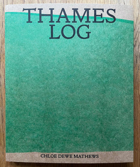 The photography book cover of Thames Log by Chloe Dewe Mathews. Paperback in green.