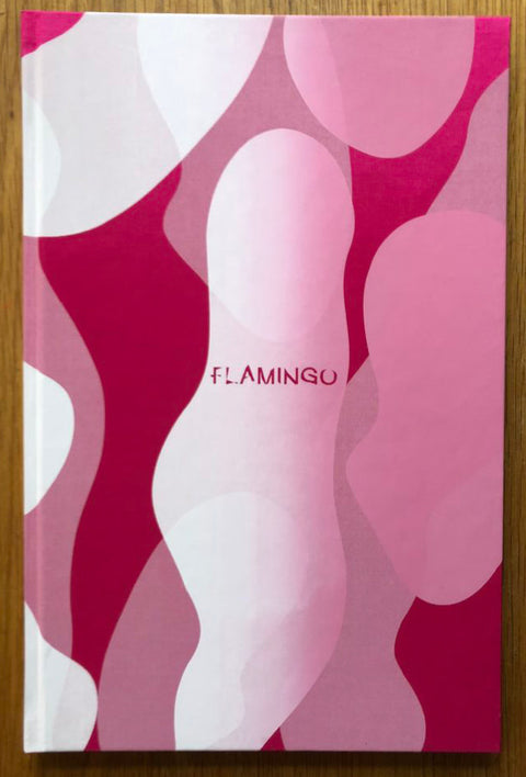 The photography book cover of Flamingo by Chloe Sells. Hardback in pink and white.