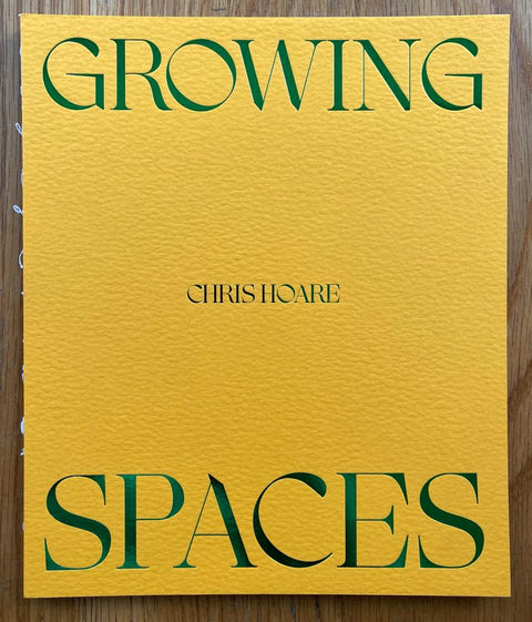 The photography book cover of Growing Spaces by Chris Hoare. Paperback in yellow and green. Signed.