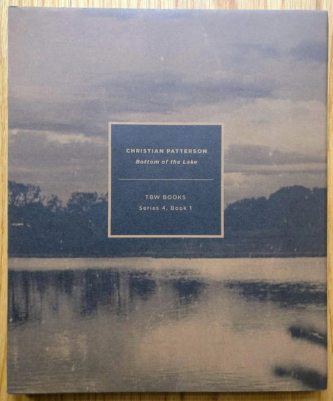 The photography book cover of Bottom of the Lake by Christian Patterson. Hardback with image of the lake on the cover.