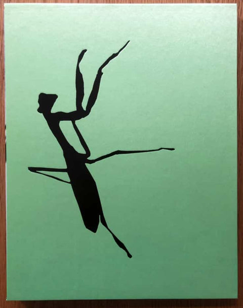 The photography book cover of Mantis by Daido Moriyama. Hardback in green with a mantis on the front.