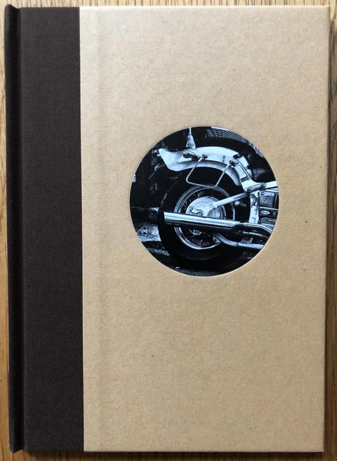 The photobook cover of Moto by Daido Moriyama. Hardback with black binding. Signed print.
