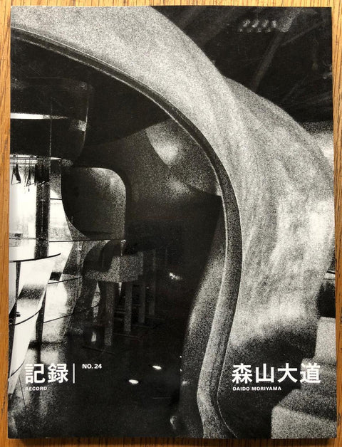 The photography book cover of Record NO.24 by Daido Moriyama. Paperback in B&W. Signed.