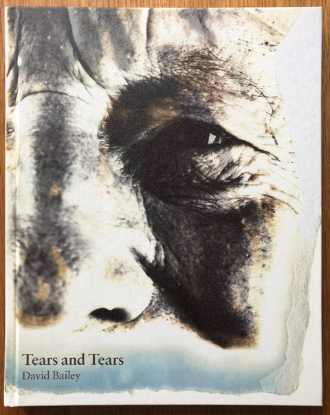 The photography book cover of Tears and Tears by David Bailey. Hardback with close up image of an elderly mans face. Signed.