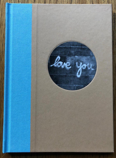 The photography book cover of Love You by Deanna Templeton. Hardback in beige with light blue binding. Signed.