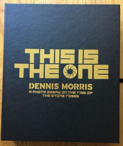 The photography book cover of This is the One by Dennis Morris. Hardback black cover with yellow text.