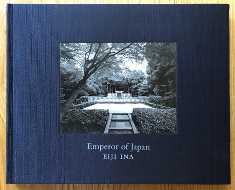 The photography book cover of Emperor of Japan by Eiji Ina. Hardback in dark blue.