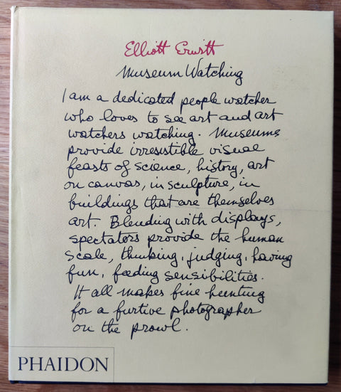 The photography book cover of Museum Watching by Elliott Erwitt. Hardback with handwriting on the cover. Signed.