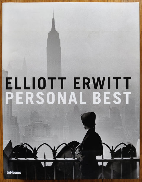 The phootgraphy book cover of Personal Best by Elliott Erwitt. In dust jacketed hardcover red.