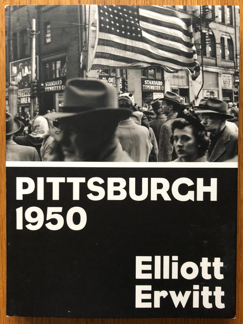 The photography book cover of Pittsburgh 1950 by Elliott Erwitt. Hardback black and white cover.