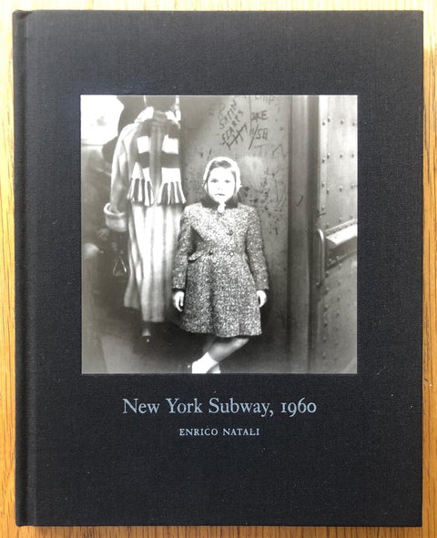 The photography book cover of New York Subway 1960 by Enrico Natali. Hardback in black.