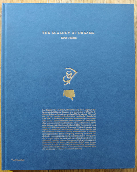The photobook cover of The Ecology of Dreams by Ewan Telford. In hardcover blue.