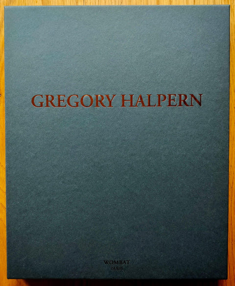 The art box for Gregory Halpern: Wombat No. 40 Art Box. Dark grey with copper writing.