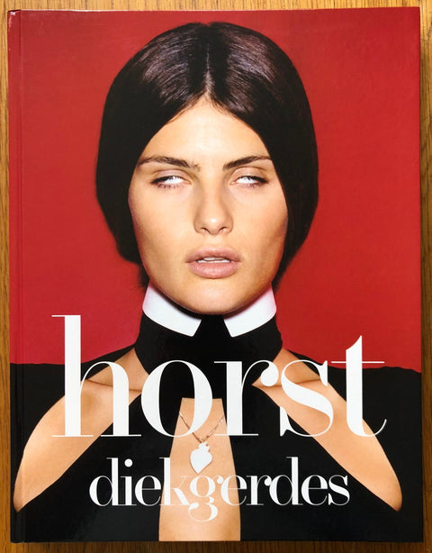 The photography book cover of Horst Diekgerdes by Horst Diekgerdes. Hardback with a woman on the cover rollng her eyes.