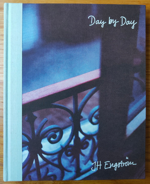 The photography book cover of Day by Day by J H Engstrom. Hardback image of a balcony.