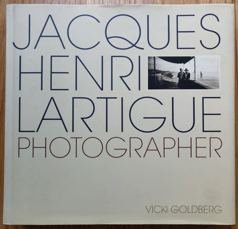 The photography book cover of Photographer by Jacques-Henri Lartigue. Hardback in white with large author and title.
