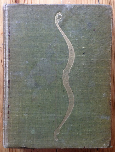 The book cover of Ulysses by James Joyce. Hardback with a gold Bow on the cover.